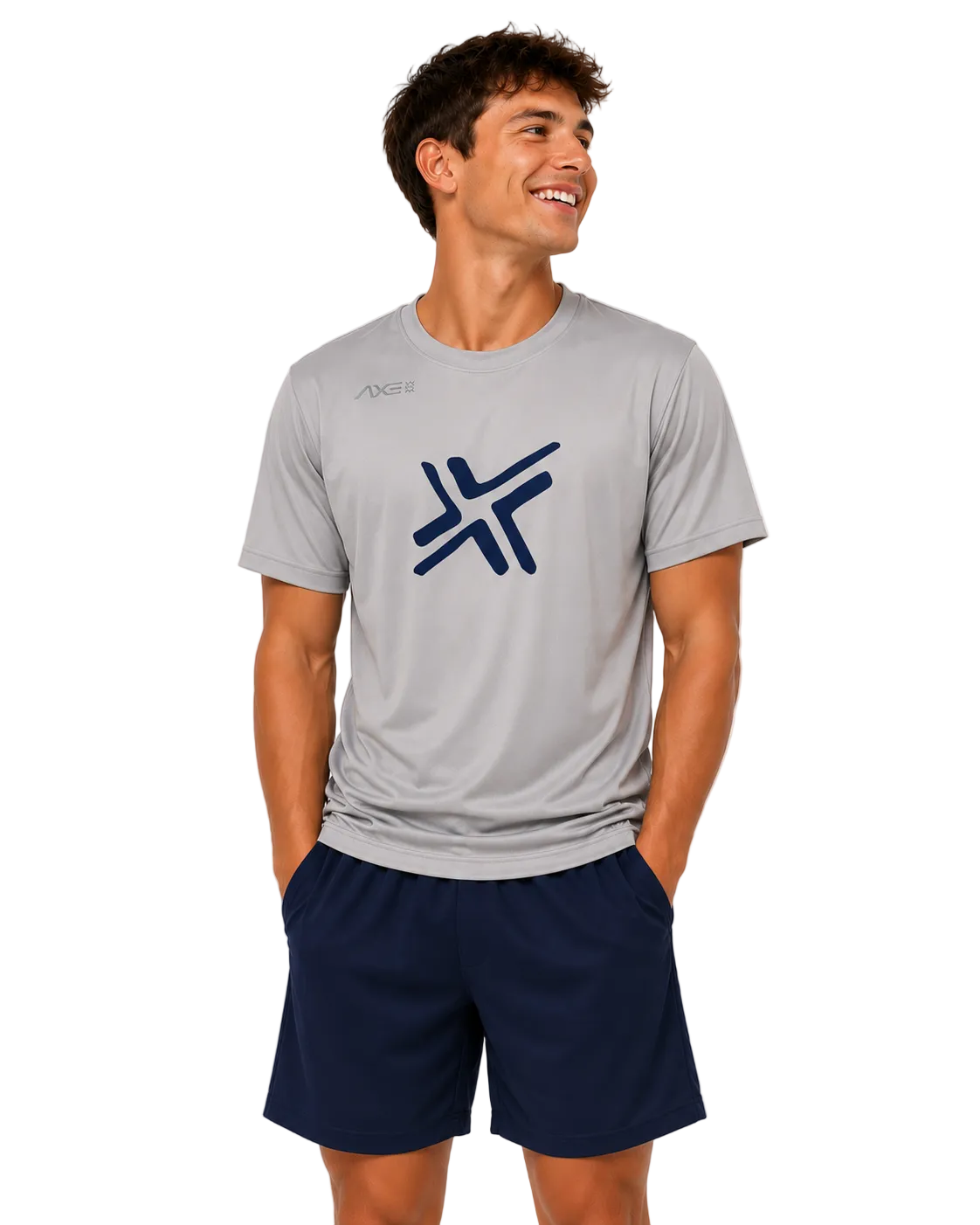 A man wearing a light gray athletic t-shirt with a navy blue logo on the chest and navy blue shorts, standing against a light gray studio background.
