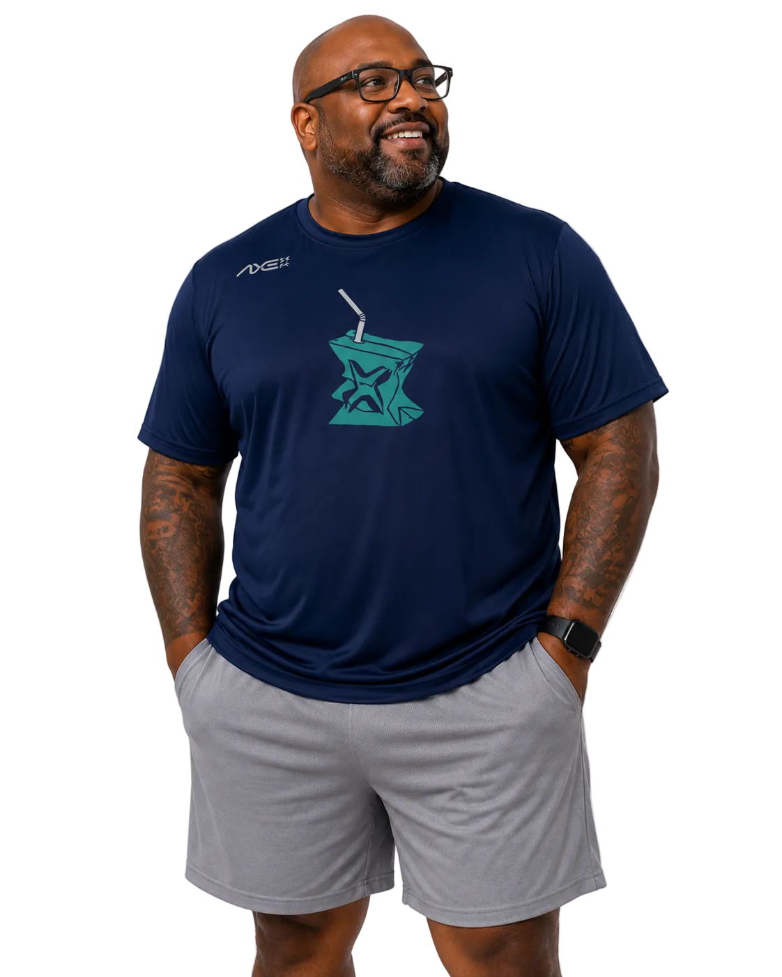 A man wearing a navy blue athletic t-shirt with a teal graphic on the chest and gray shorts, standing against a plain white background.