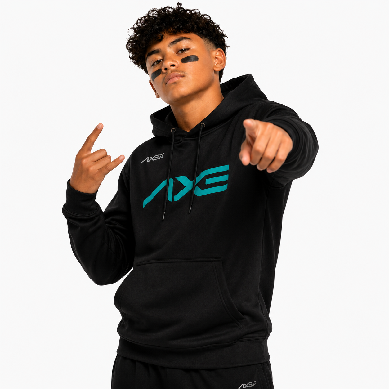 A young man wearing a black hoodie with a large teal and white AXE logo on the chest, posing against a light gray background.
