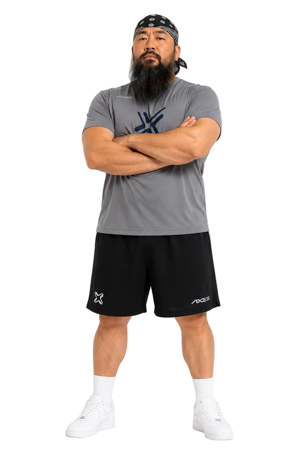 A man modeling a gray short-sleeve athletic t-shirt and black athletic shorts against a plain white background. The t-shirt features a dark blue geometric logo on the chest, and the black shorts feature white logos on the left leg.