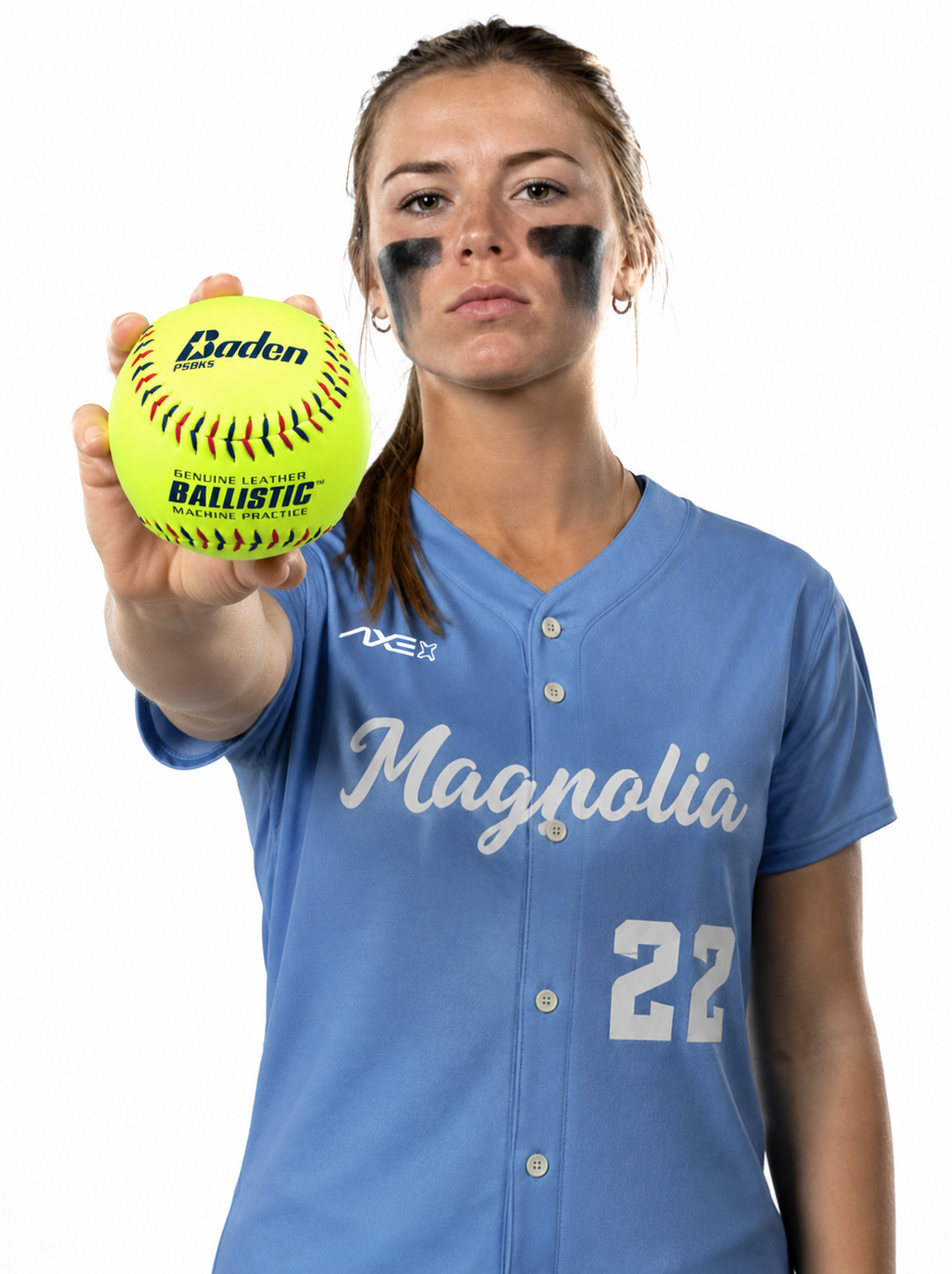Fastpitch softball player in a custom Axe Magnolia uniform holding a Baden Ballistic genuine leather machine practice softball