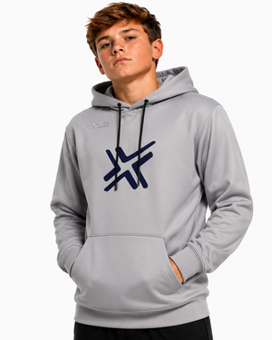 A young man wearing a light gray pullover hoodie with a dark navy blue graphic logo on the chest, posed against a clean white background.