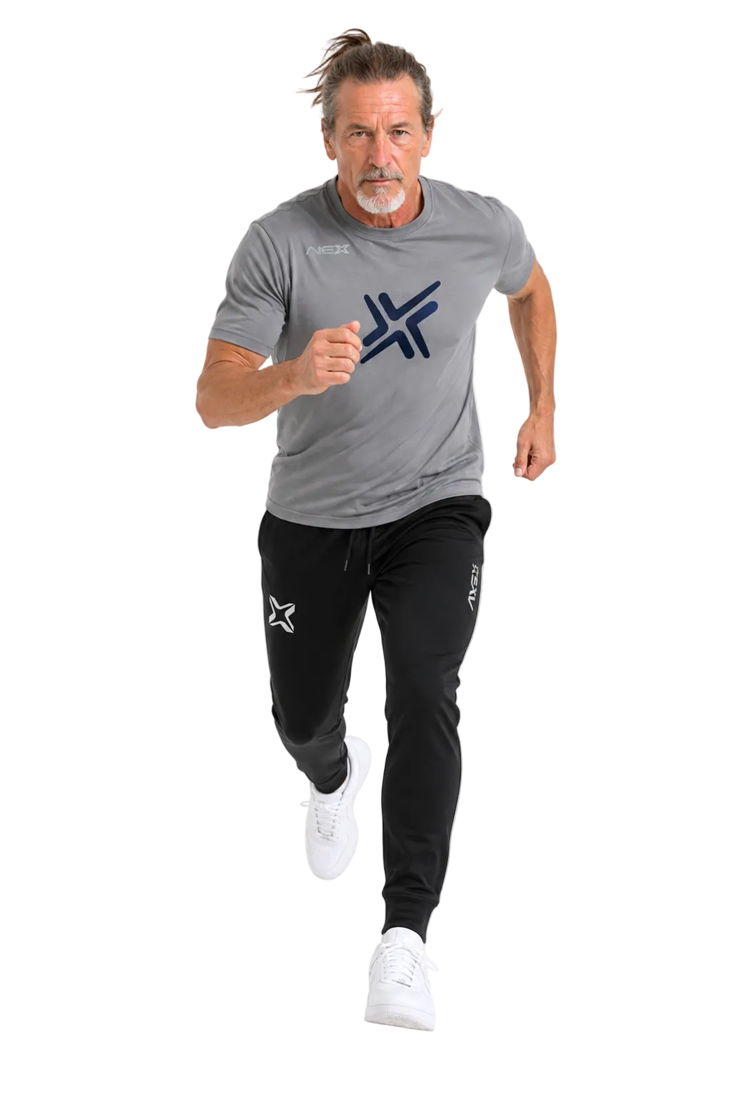 A man running forward in a gray athletic t-shirt and black jogger pants with white sneakers, featuring a dark blue geometric logo on the chest and a white star logo on the thigh.