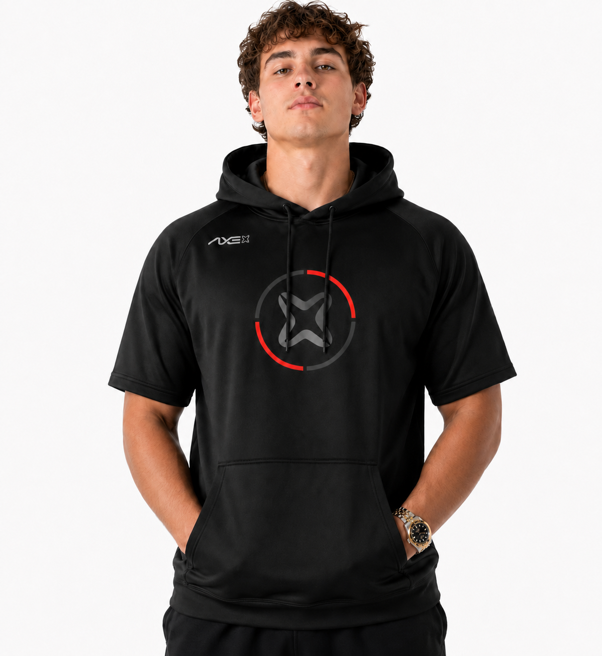 A man wearing a black short-sleeve hoodie with a circular logo on the chest and a small AXE logo on the right shoulder, photographed against a light gray studio background.