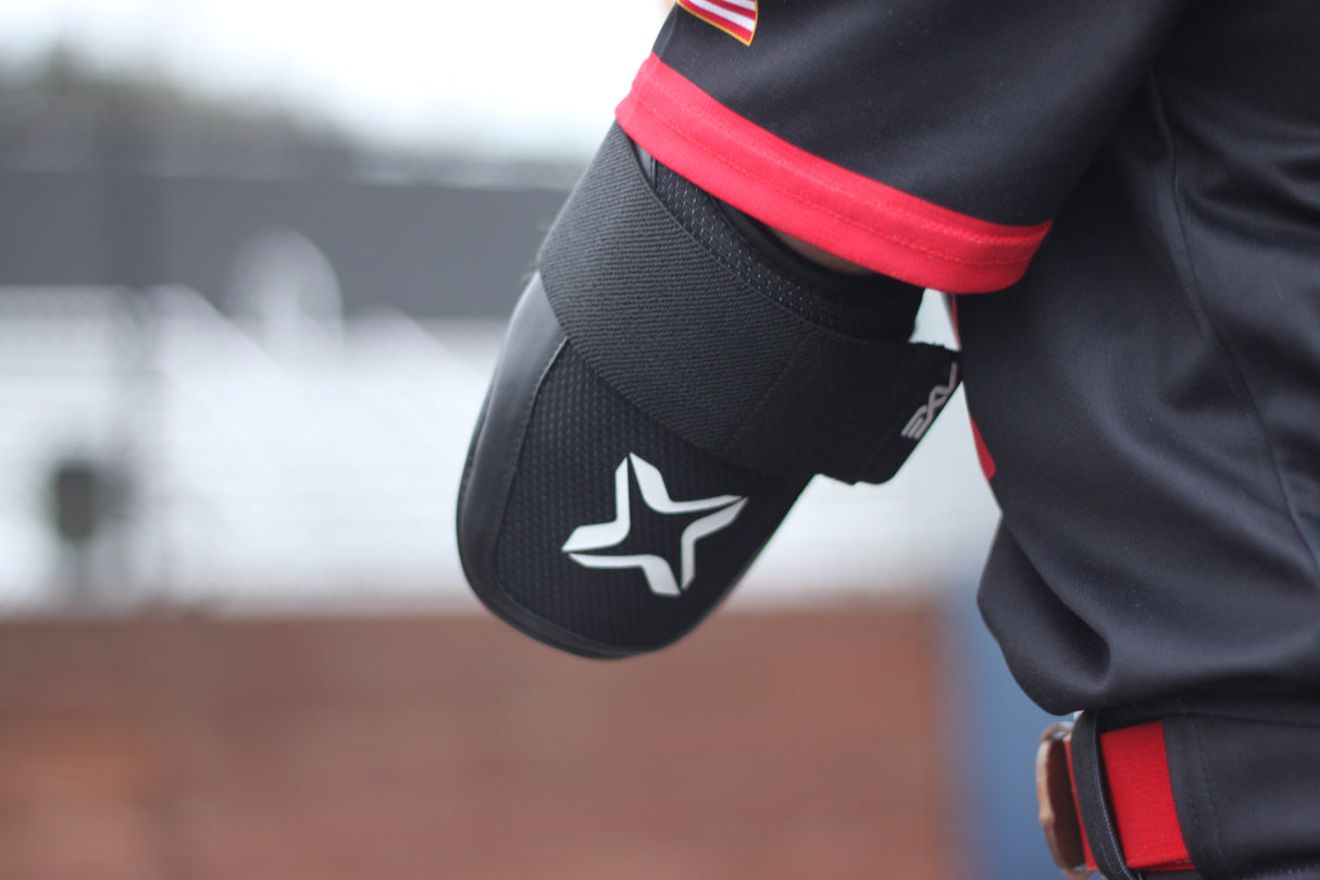 Axe Armor Elbow Guard, Ice Cap White, worn.