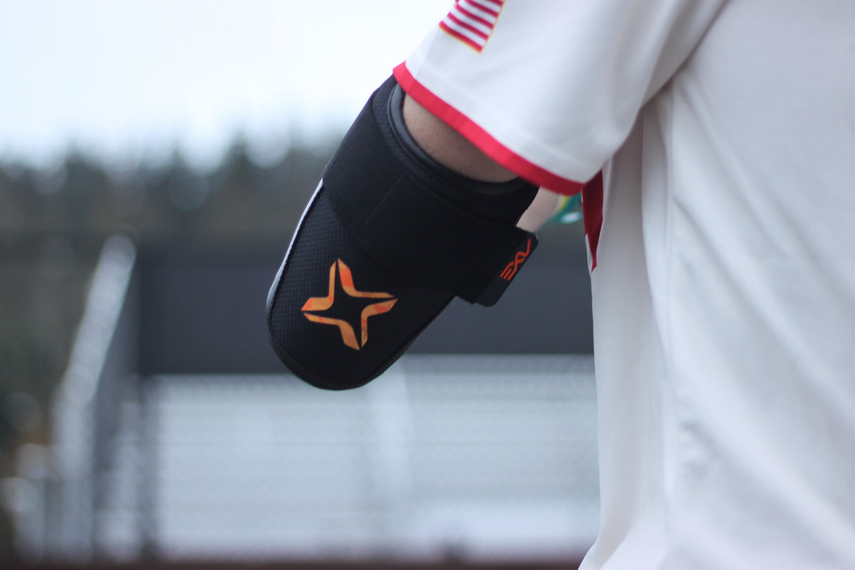 Axe Armor Elbow Guard, Magma Orange, worn.