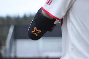 Axe Armor Elbow Guard, Magma Orange, worn.