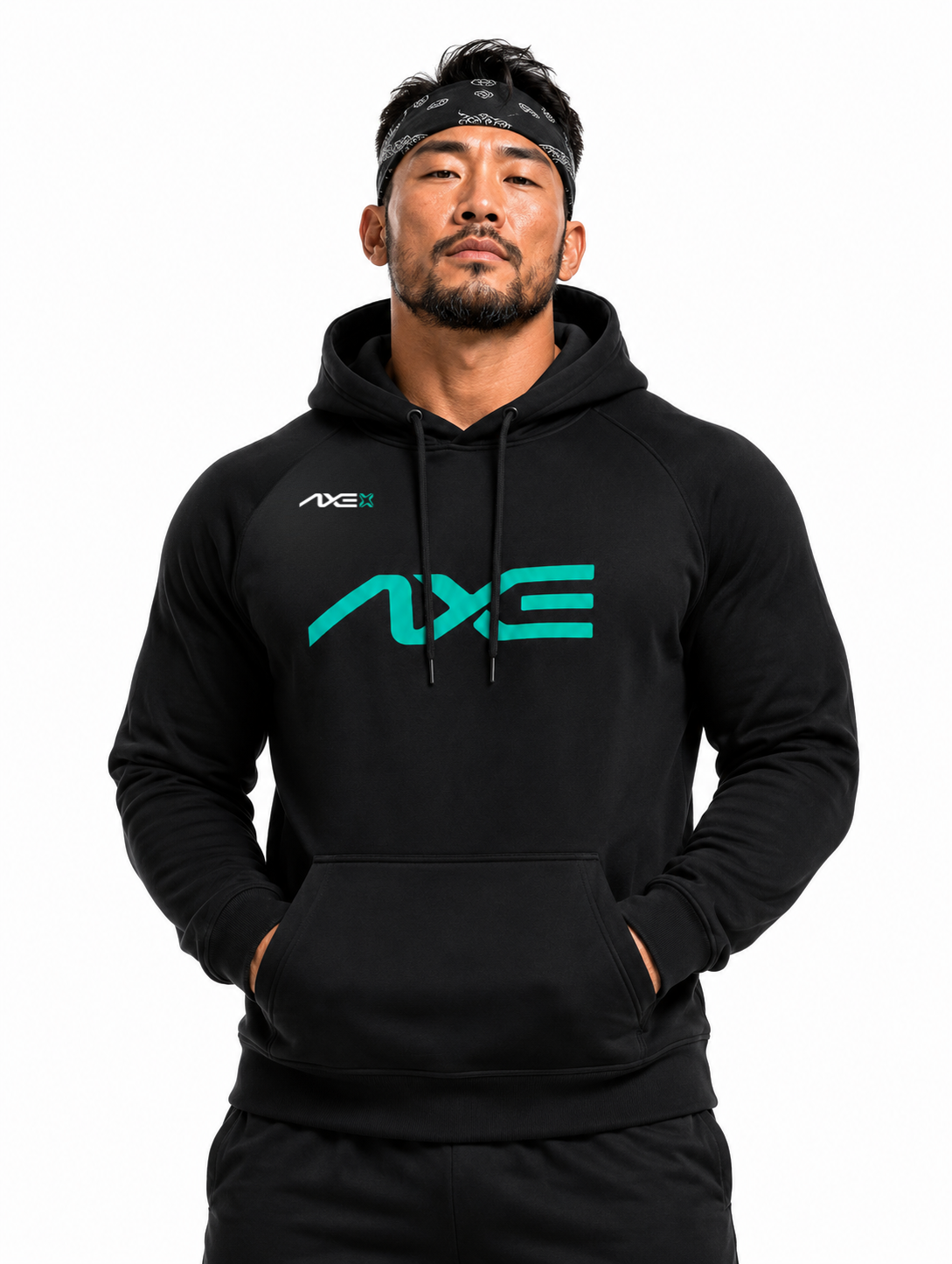 Man wearing the black Axe Scuba Hoodie with the teal AXE logo across the chest, paired with black Axe joggers.