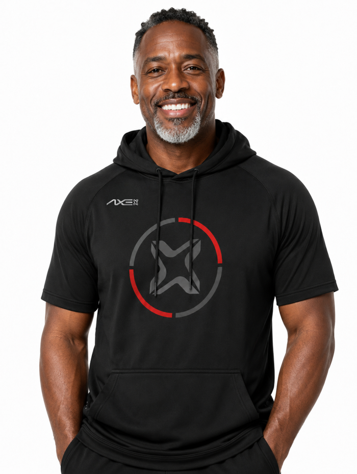 Man wearing the black Fury Bravo Axe Short Sleeve Scuba Hoodie with the charcoal Axe X emblem ringed in red and gray on the chest.