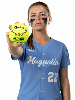 Fastpitch softball player in a custom Axe Magnolia uniform holding a Baden Ballistic genuine leather machine practice softball